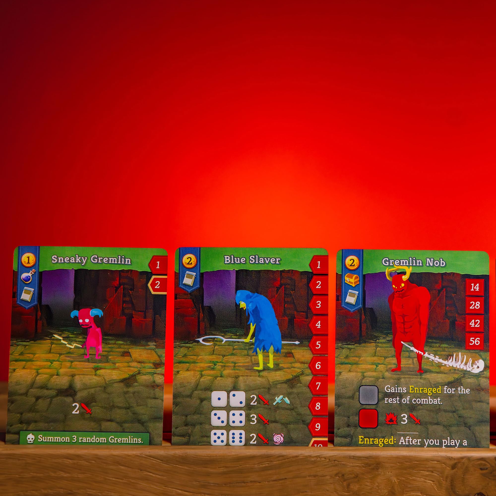 Contention Games' Slay The Spire box and setup laid out for easy learning.