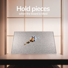 Coobe puzzle cover with handle protects pieces when not in use.