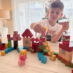 Coodoo blocks use eight strong magnets for stable, expandable builds.