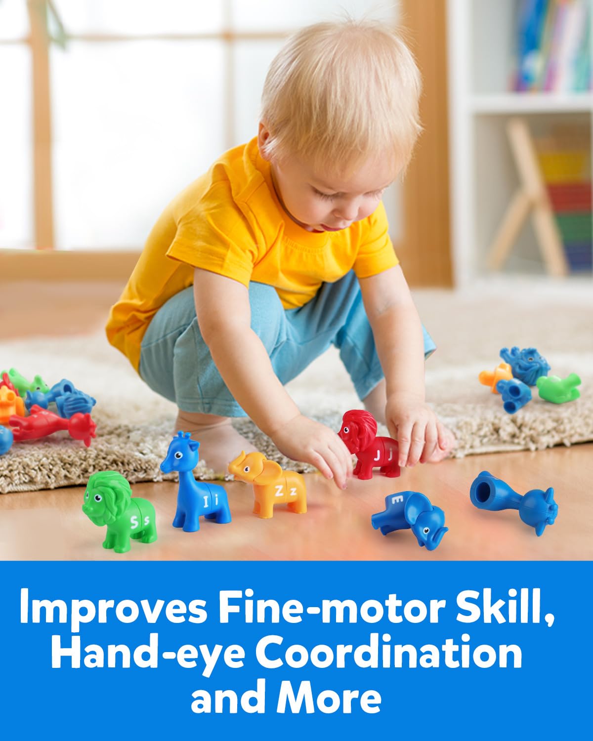 Colorful animal cards on a table create engaging color and letter sorting activities.