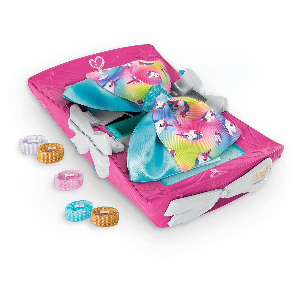 Cool Maker glitter clasps add sparkle to bows.