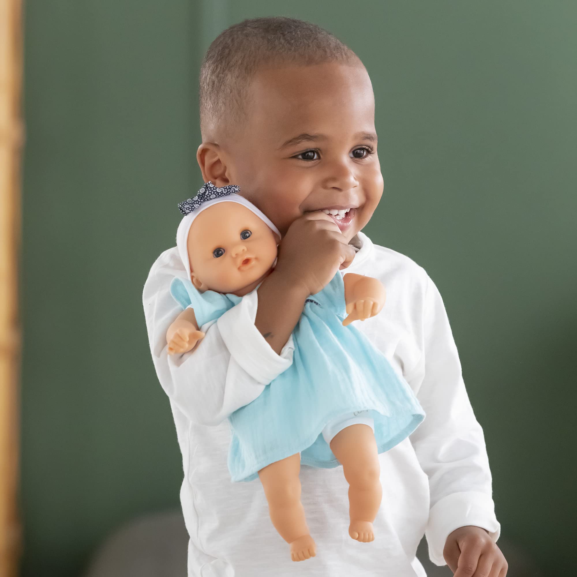 Corolle Bébé Calin Maud held in arms for comforting play.