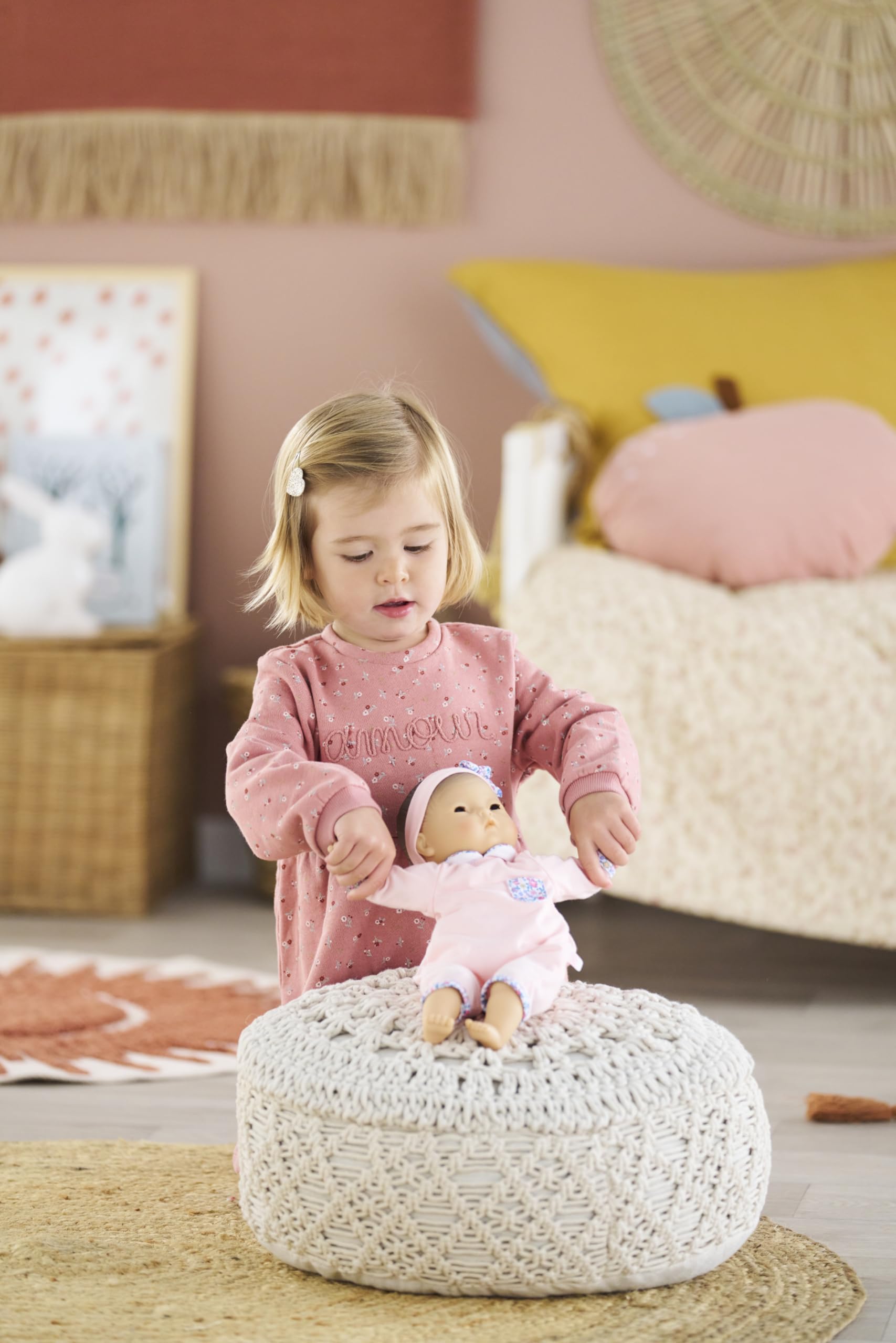 Corolle Bebe Calin Mila offers expandable play with additional outfits and accessories.