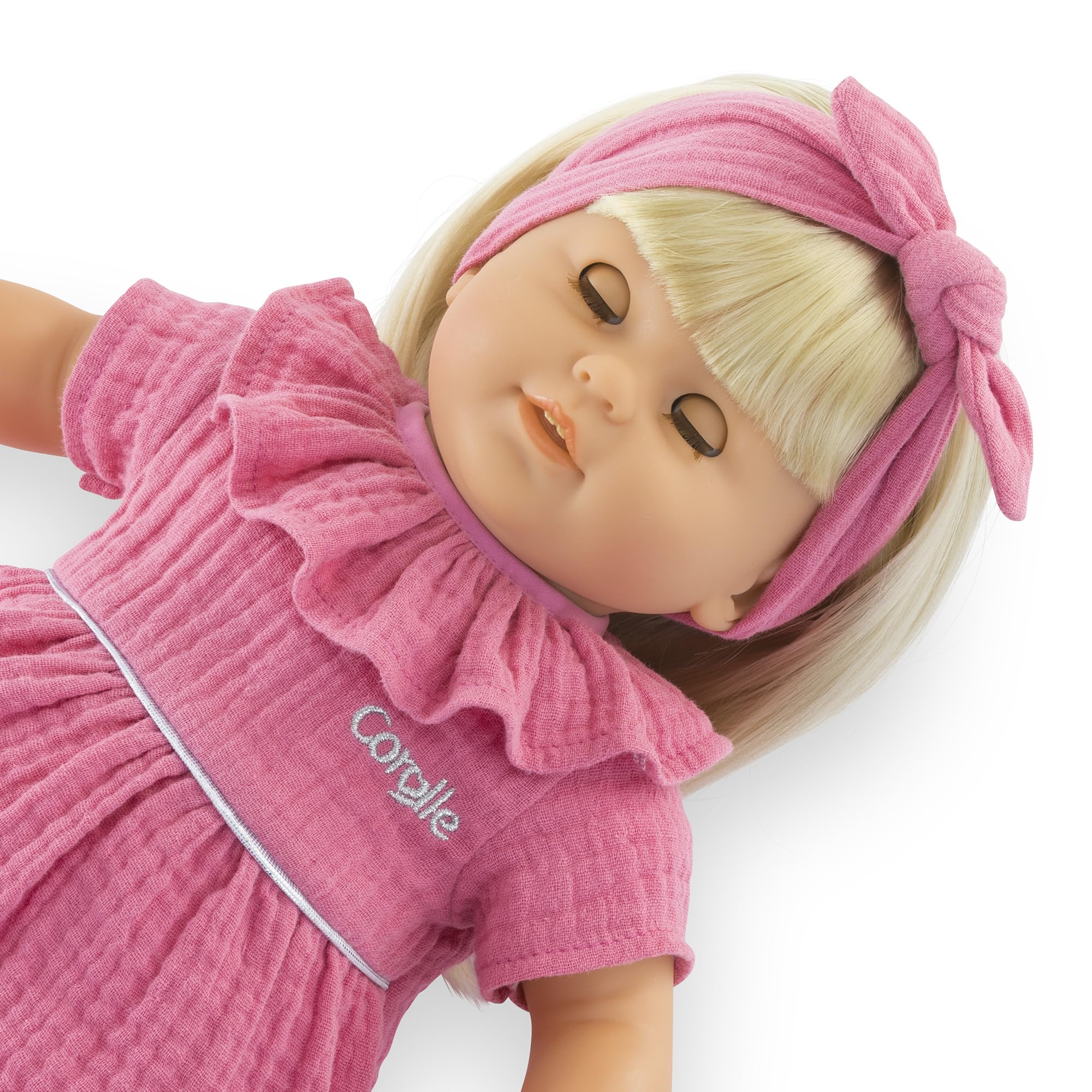 Corolle Jade cap accessory expands outfit options and imaginative play.