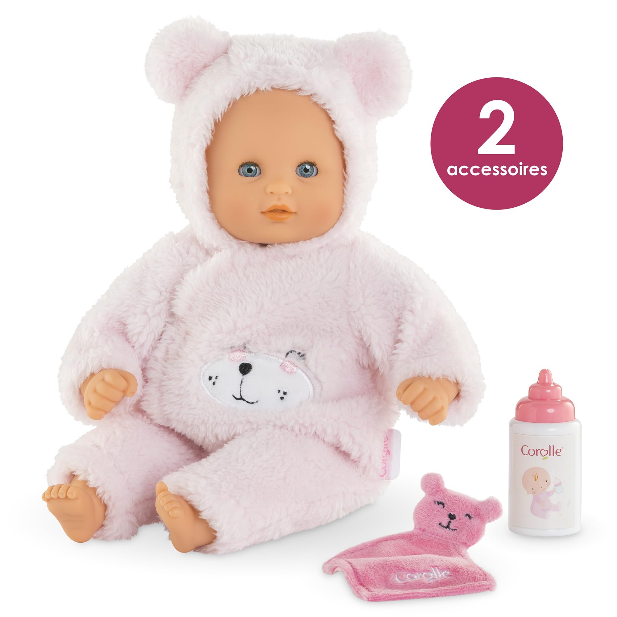 Corolle soft vinyl skin and gentle scent invite curious touch.