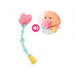Corolle pacifier clip-on secures to doll clothing for easy use