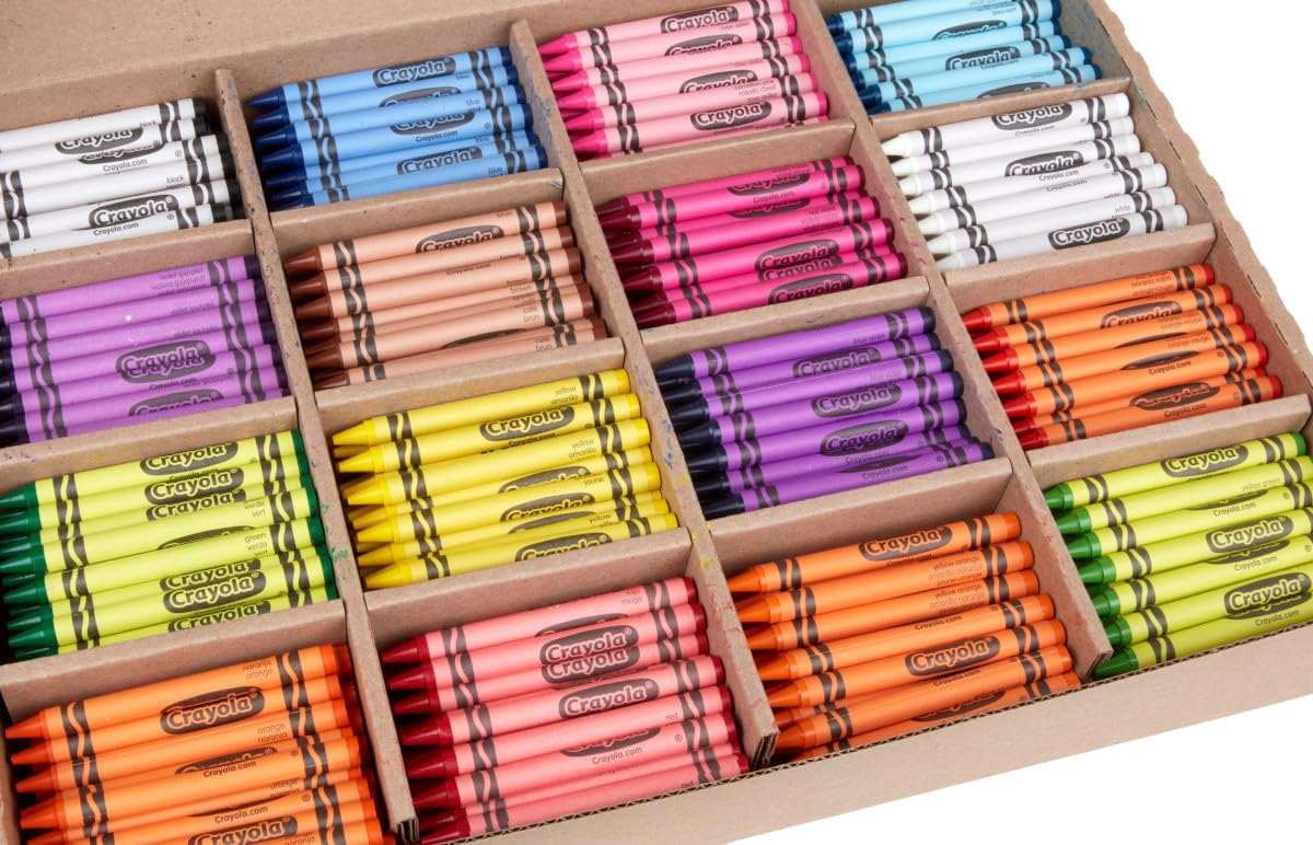 Classroom scene of kids coloring with bulk Crayola crayons.