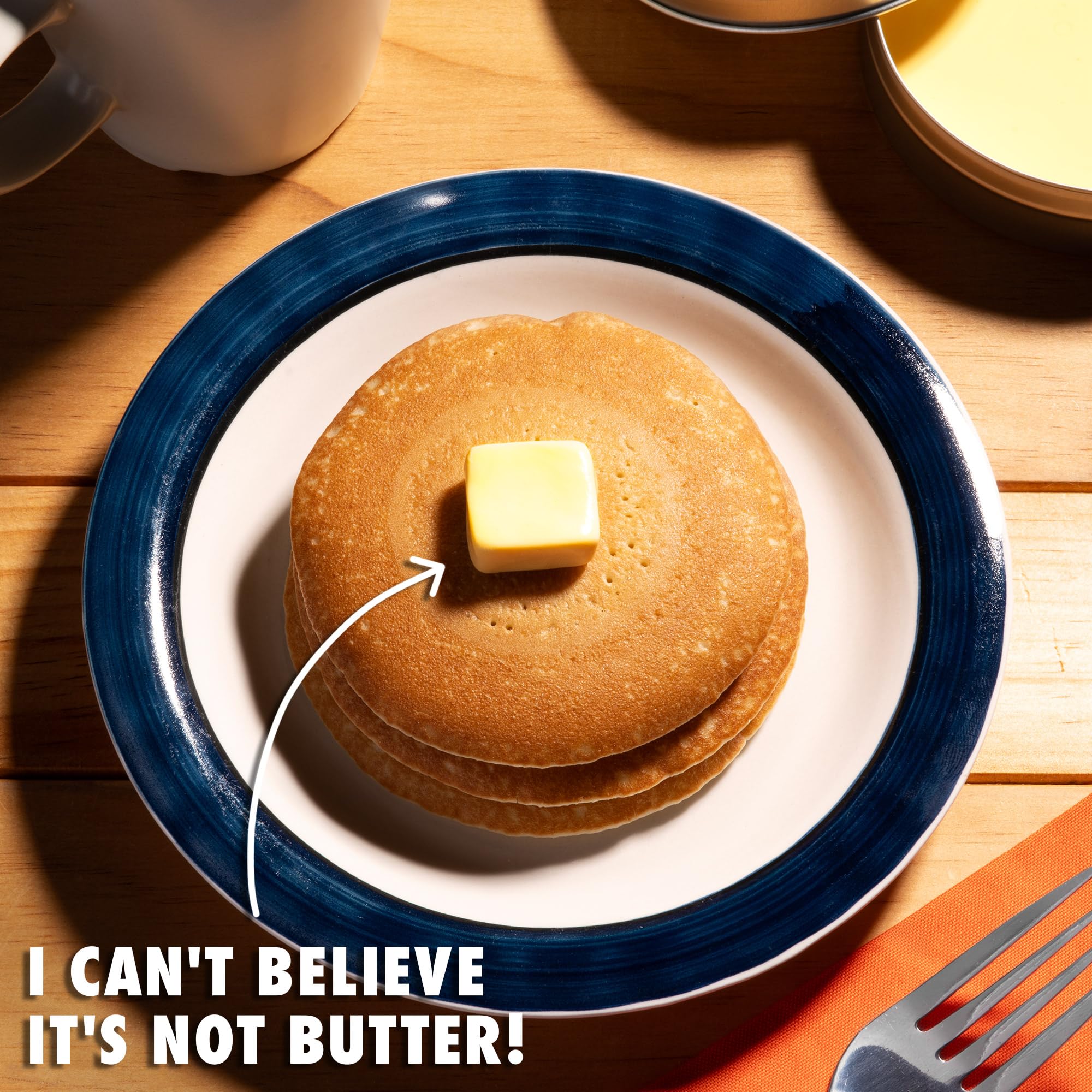 Better Butter Thinking Putty in tin, showcasing bright yellow shade and spreadable consistency.