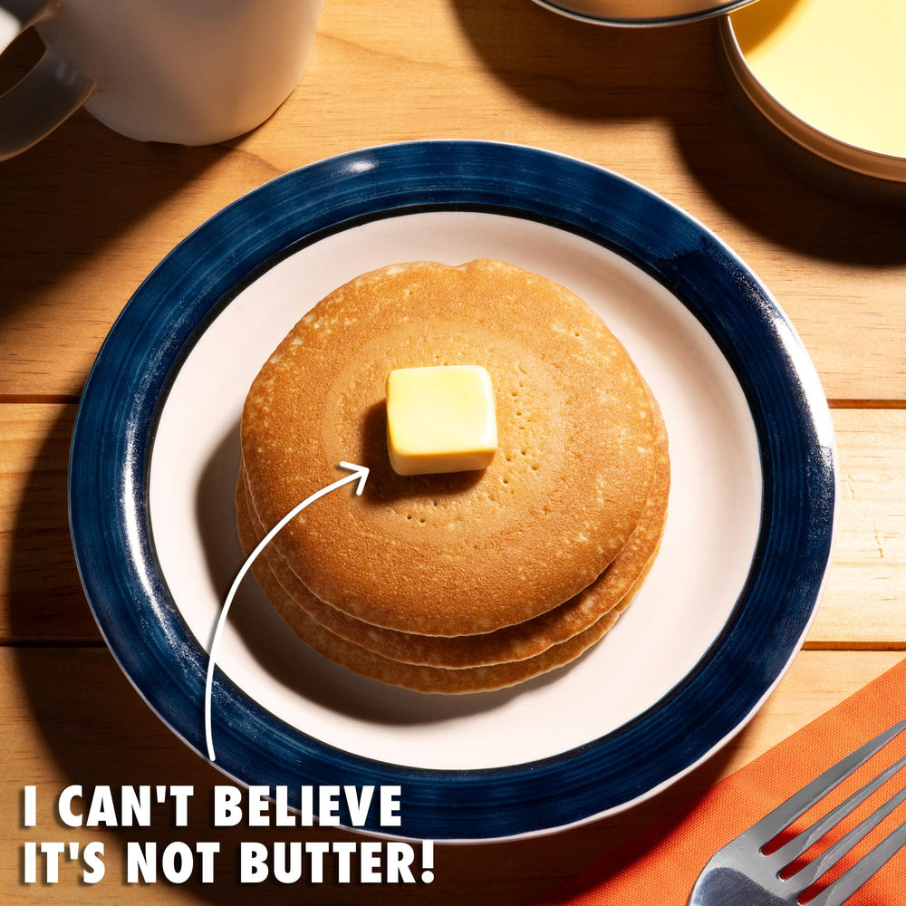 Better Butter Thinking Putty in tin, showcasing bright yellow shade and spreadable consistency.