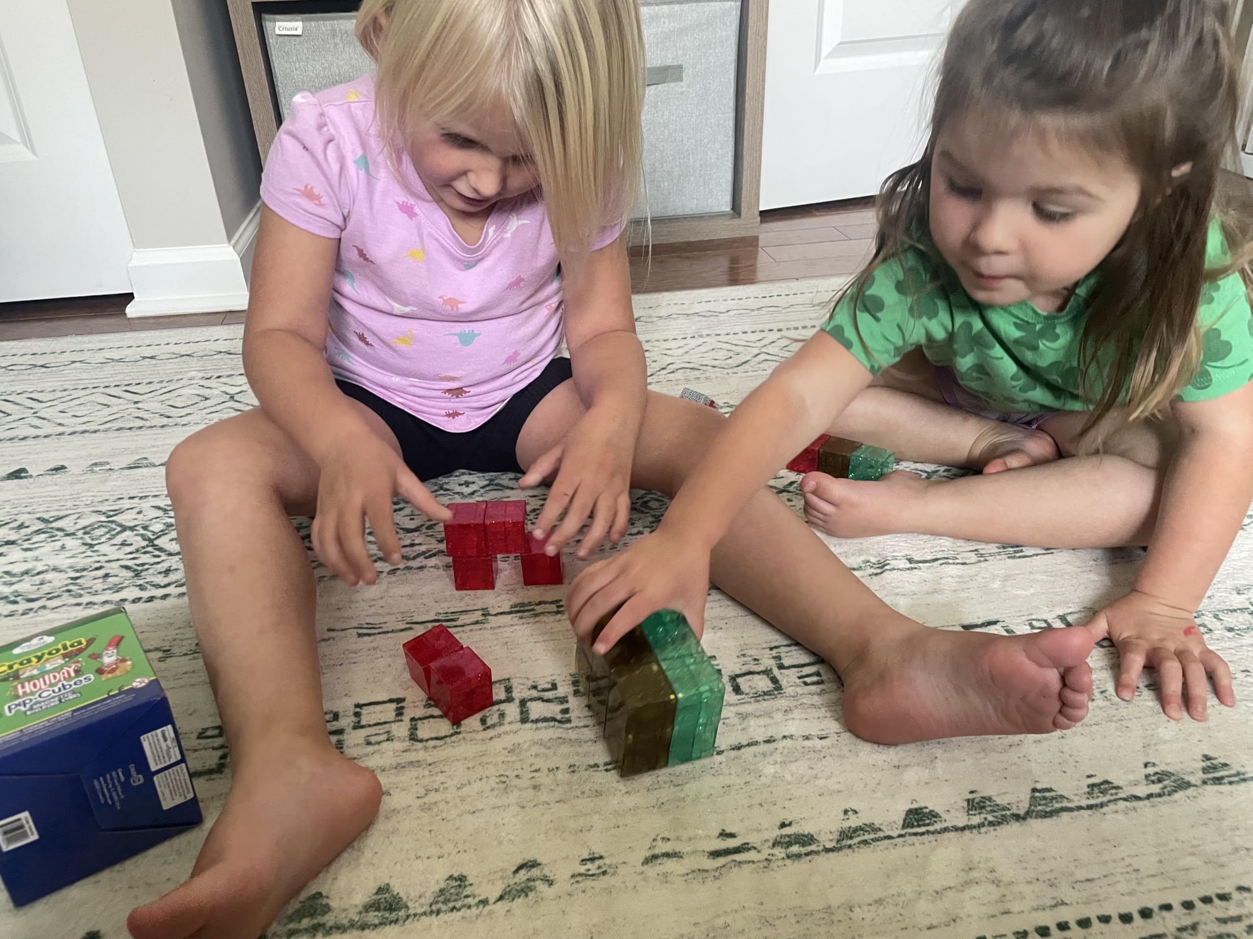 CreateOn Crayola PIP Cubes stacked into a tower showing magnetic connections.