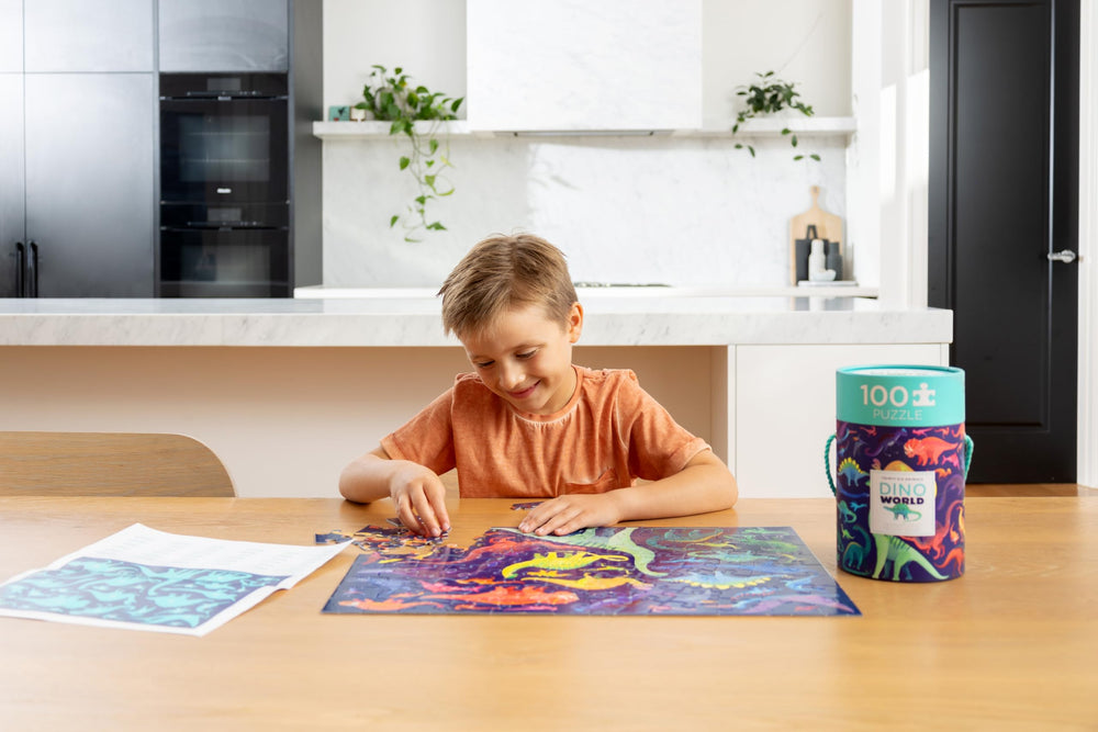 Crocodile Creek 100-piece puzzle for kids, colorful dinosaurs spark focus.