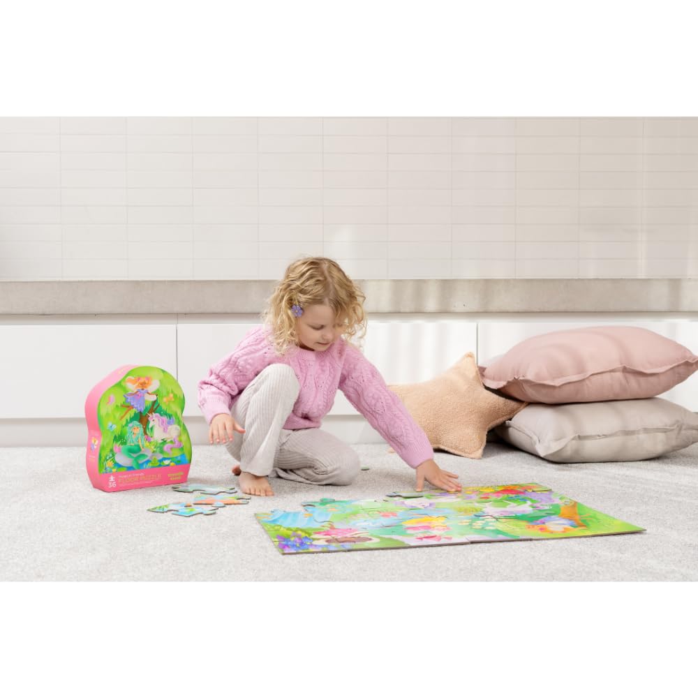 Crocodile Creek floor puzzle set up on a rug for family puzzle time.