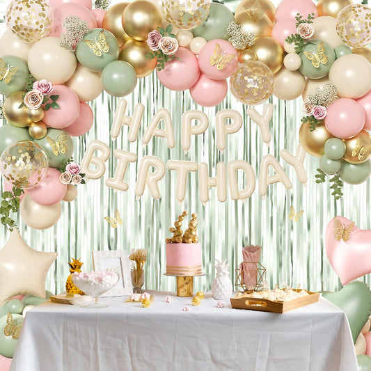 Crossfingers sage-green fringe curtains as a photo backdrop