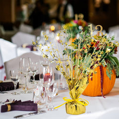 Crowye gold star centerpiece on dining table elevates festive gatherings