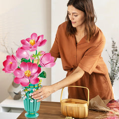 CUBIMANA vase with flower bouquet adds a refined centerpiece to any room.