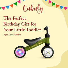 Cubuly Green Christmas edition bike under festive lights.