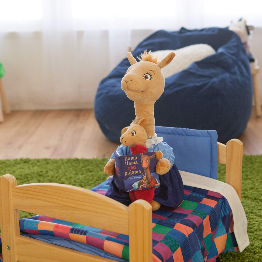 Cuddle Barn Mama Llama 14-inch plush ships with batteries included for immediate play.