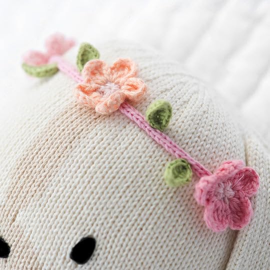 Cuddle + Kind Charlotte doll peruvian craftsmanship with artisan details.