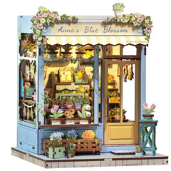 CUTEBEE Anna's Blue Blossom book nook on a shelf with floral detailing for cozy decor.