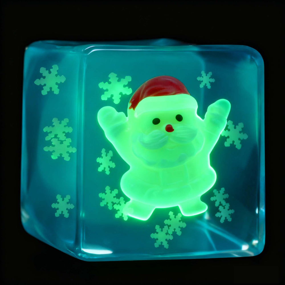CYICTOY glow-in-the-dark Santa cube lights up dark desks for playful focus after hours.