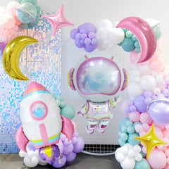 CYMYLAR astronaut girl balloons enhance a girls' space-themed party setup.