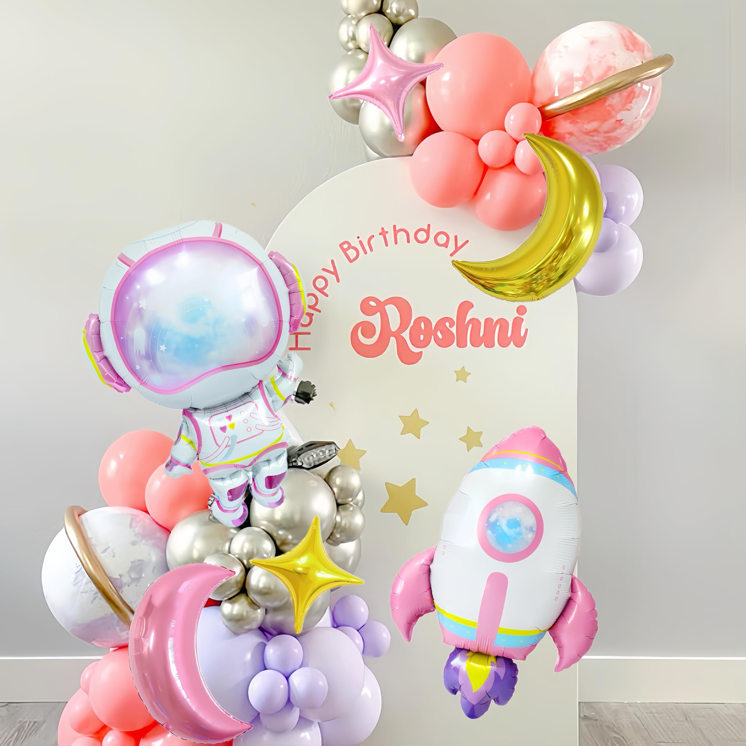 CYMYLAR moon balloons provide dreamy lunar accents for the display.