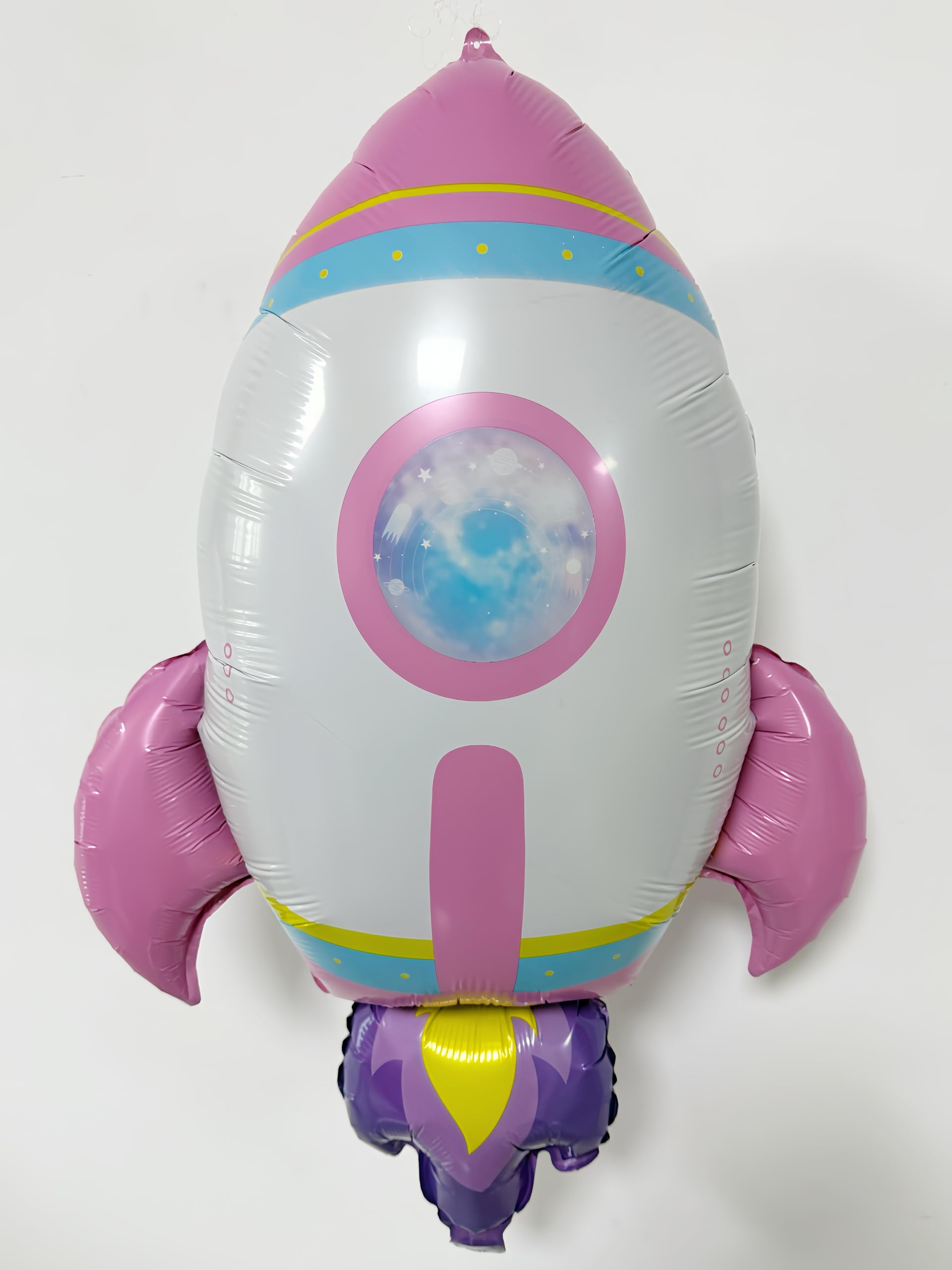 CYMYLAR rocket balloons in pink and purple add a bold focal point for photos.