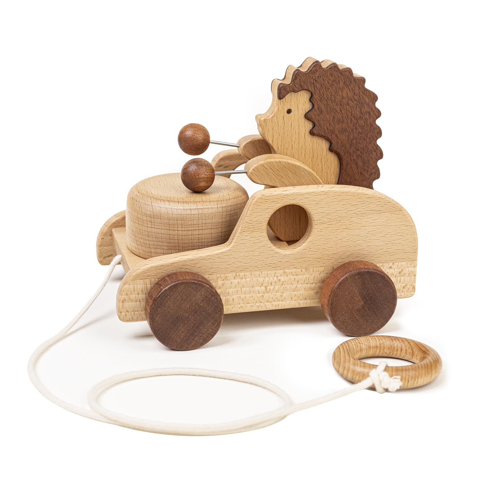 DadCarved Hedgehog pull-along toy with drum-arms promotes rhythm and walking exploration.