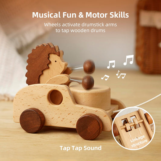 DadCarved Hedgehog pull-along toy features wooden drums for tactile sound discovery.