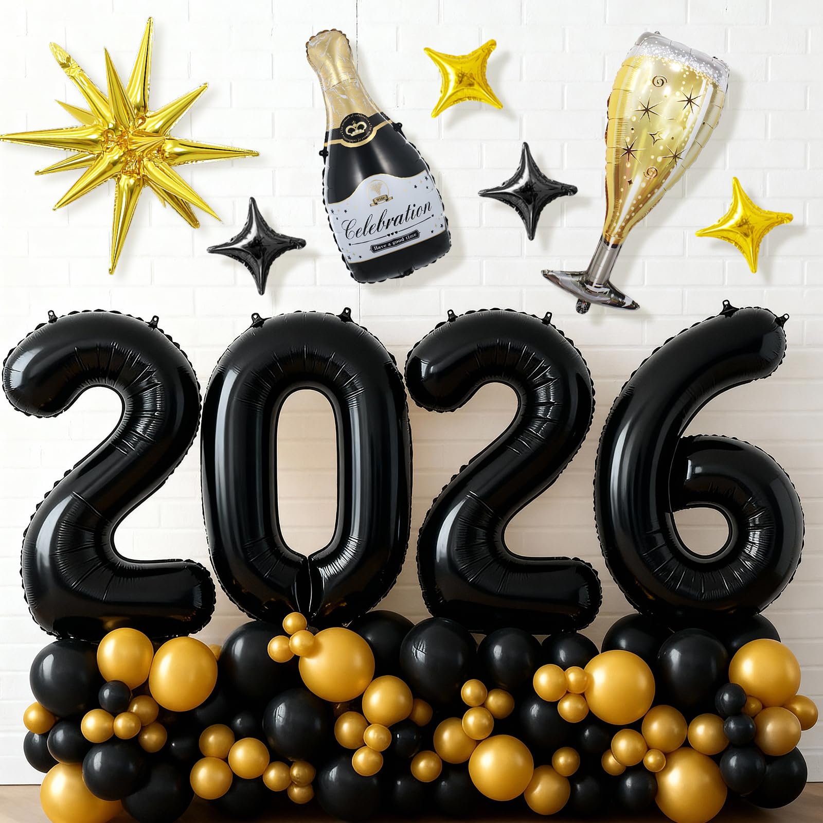 Dagelar gold glass foil balloon as a centerpiece highlight.
