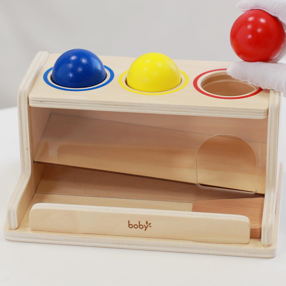 Dailyfunn drop toy illustrating ball release action