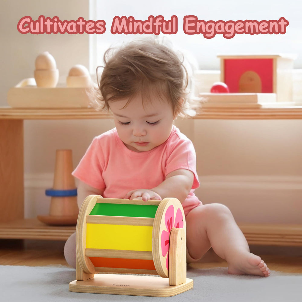 Dailyfunn three-stage tummy time spinning drum tummy time guides neck and arm development.