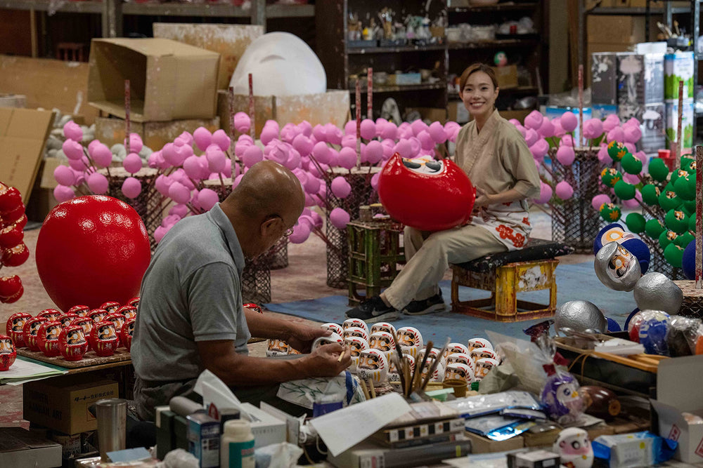 Daimonya Daruma Doll displayed on a desk to inspire focus and good wishes.