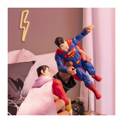 DC Comics 12-Inch Superman figure with 11-point articulation for varied poses.