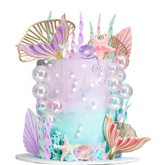 DiDida mermaid cake topper with big tails enhances under-the-sea celebrations and photo-ready moments.