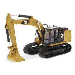 Diecast Masters Caterpillar 320F L front view shows authentic panel details for display.