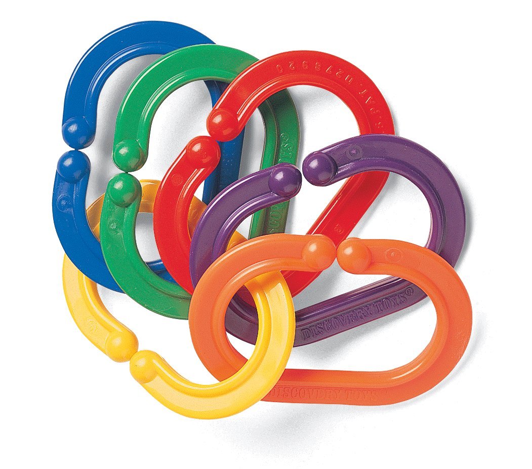Discovery Toys Boomerings attached to a stroller for on-the-go learning.