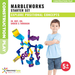 Discovery Toys MarbleWorks Marble Run Starter drop zone demonstrates gravity and timing in play.