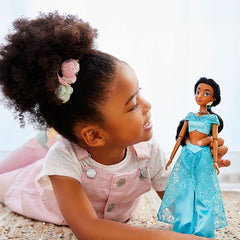 Matching necklace adds finishing touch to Jasmine's classic ensemble.