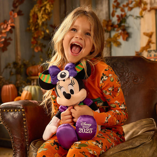 Disney Store Minnie Mouse plush shows embroidered features for lasting detail and charm.