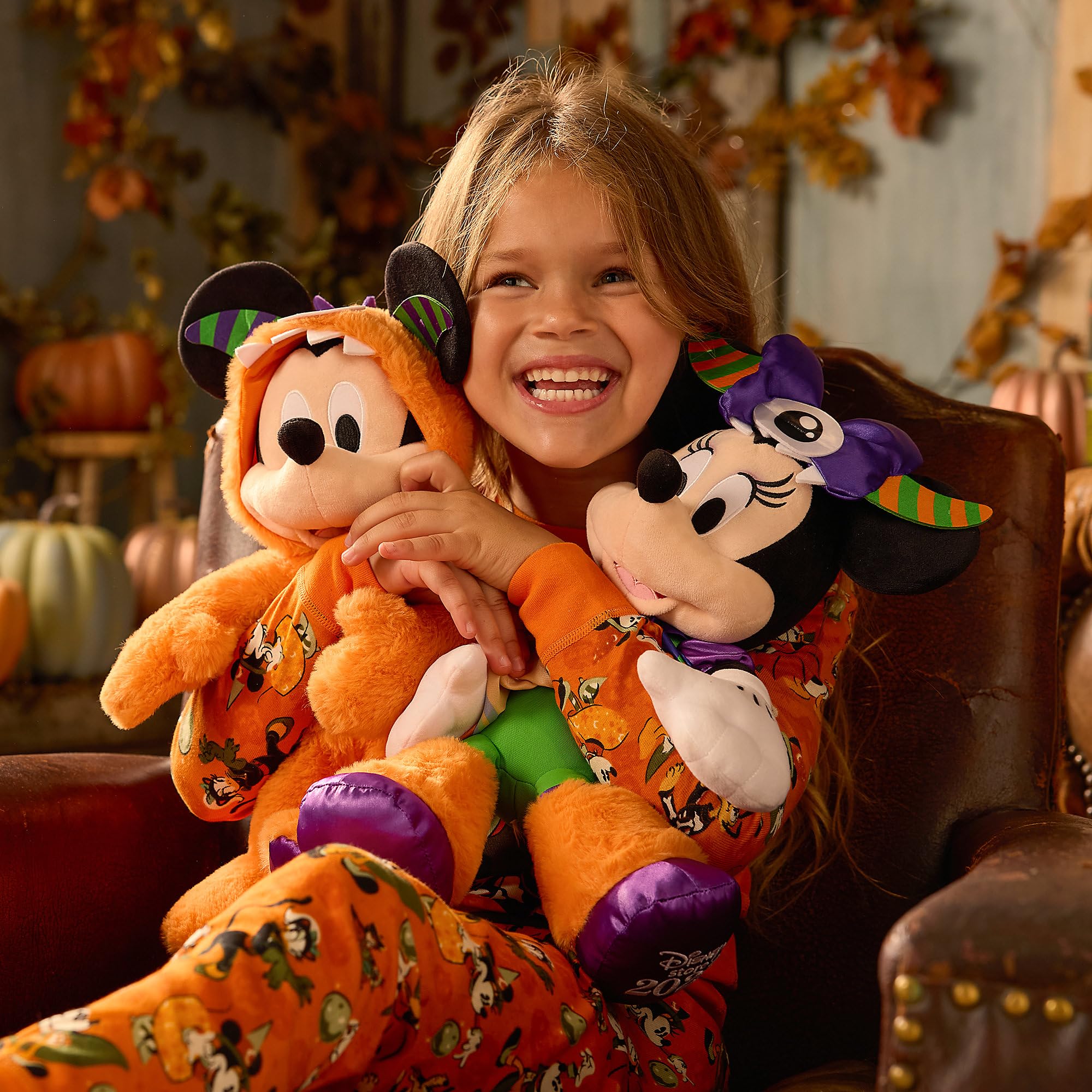 Disney Store Minnie Mouse plush boasts embroidered logo on left foot for collectors.