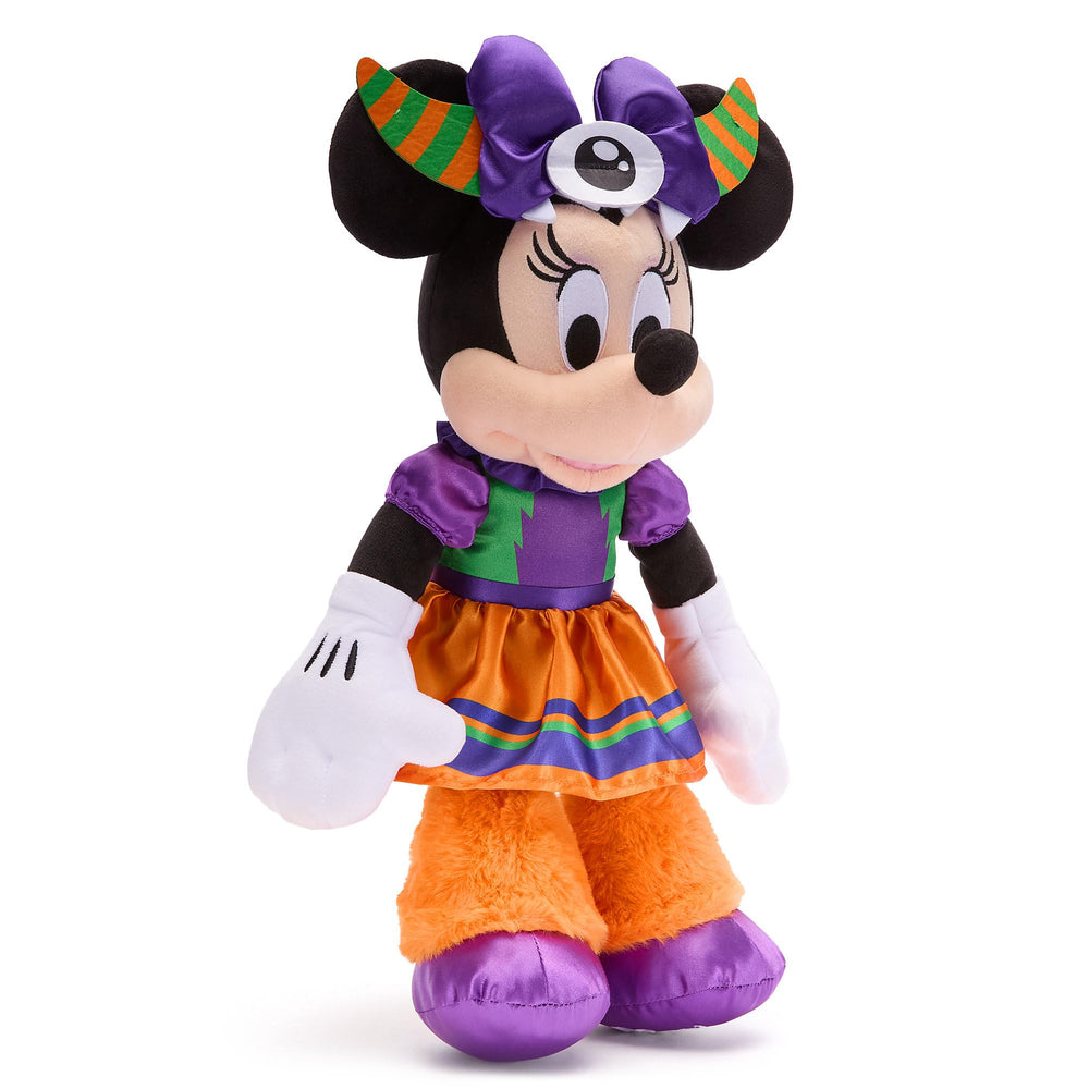 Disney Store Minnie plush with satin bow brings cute precision to Halloween décor.