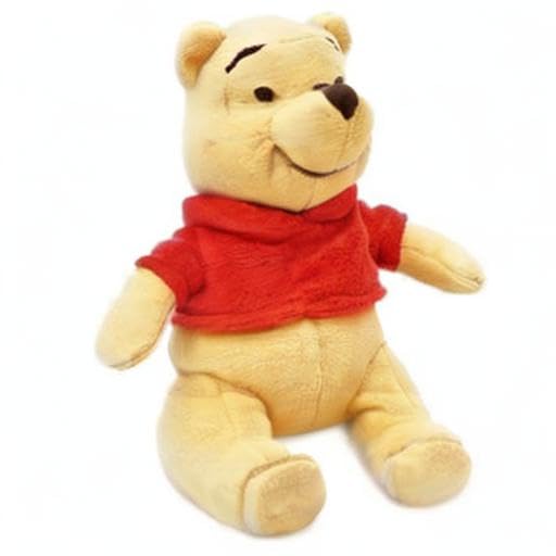 Embroidered features and detailed sculpting capture Pooh's charm in soft velour fabric.
