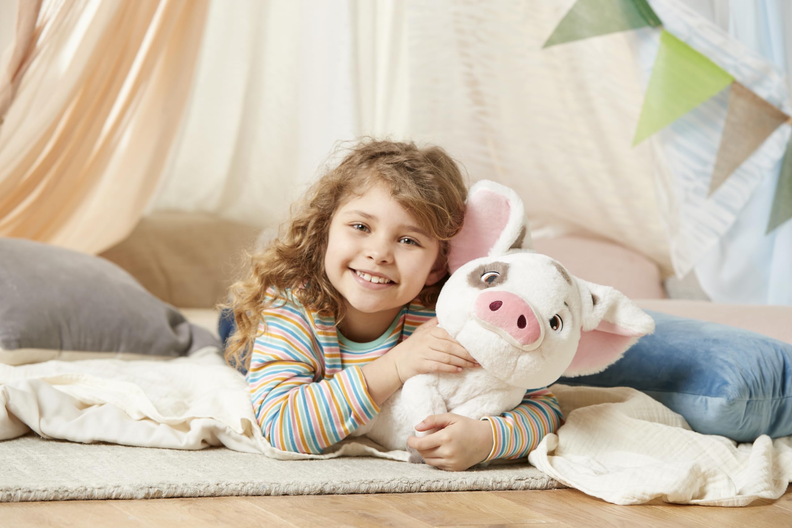 Disney Store Pua plush sized at 13 inches for easy holding.