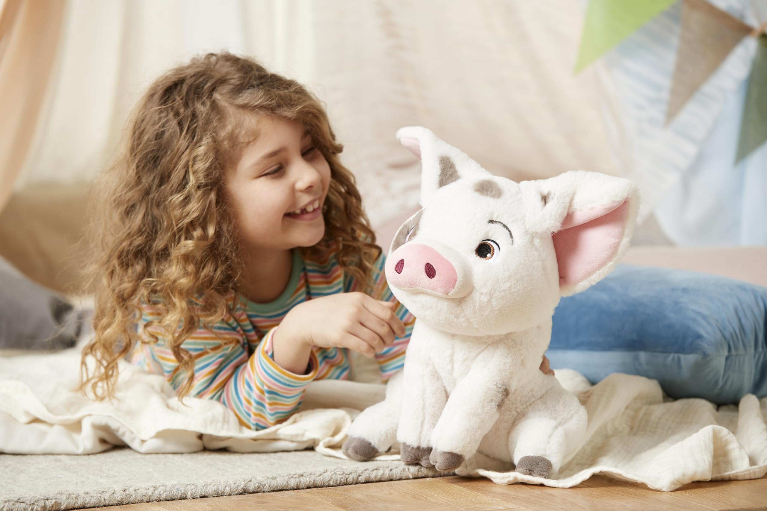 Disney Store Pua plush features pink ears for cute, huggable charm.
