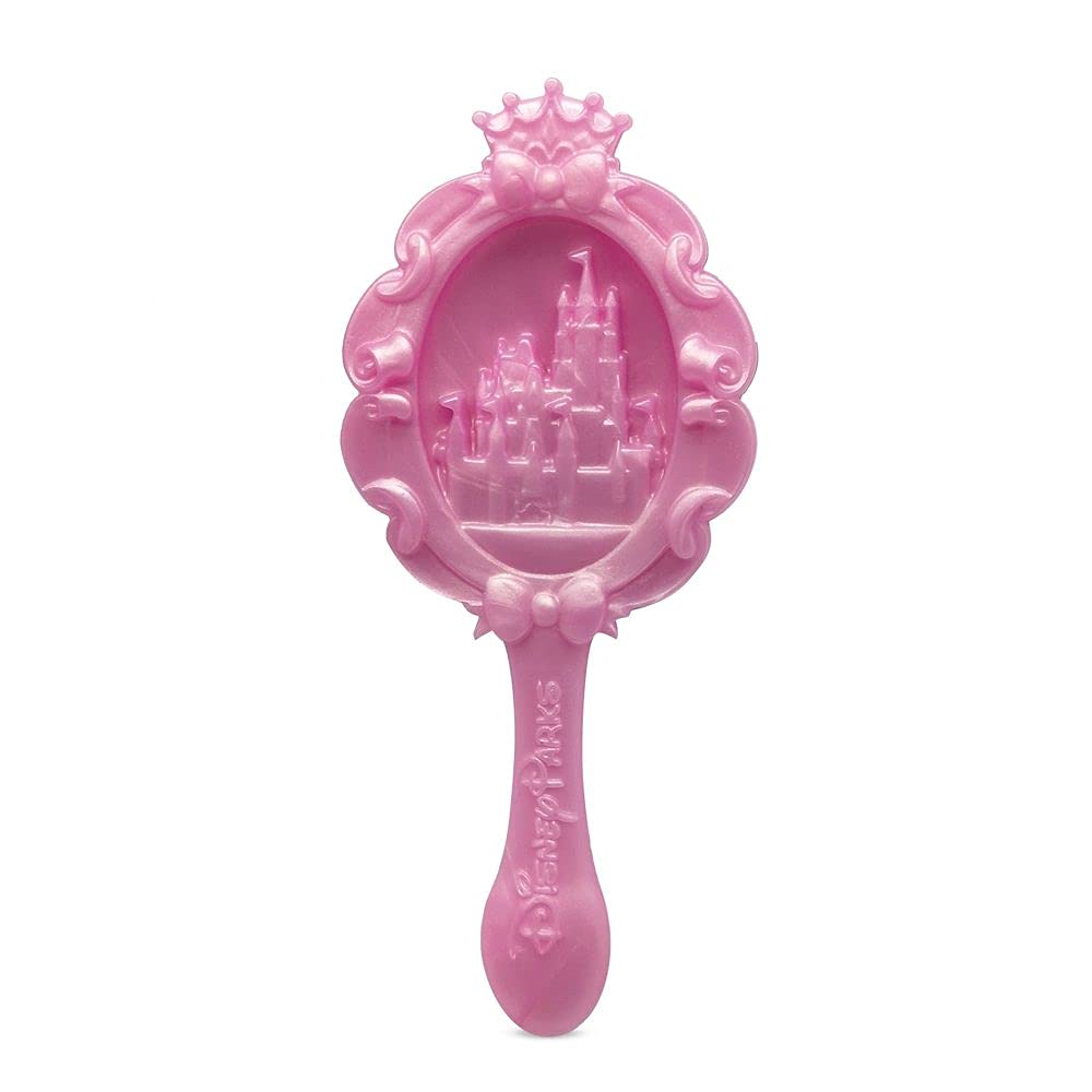 Disney Store Rapunzel doll with molded brush included for styling.