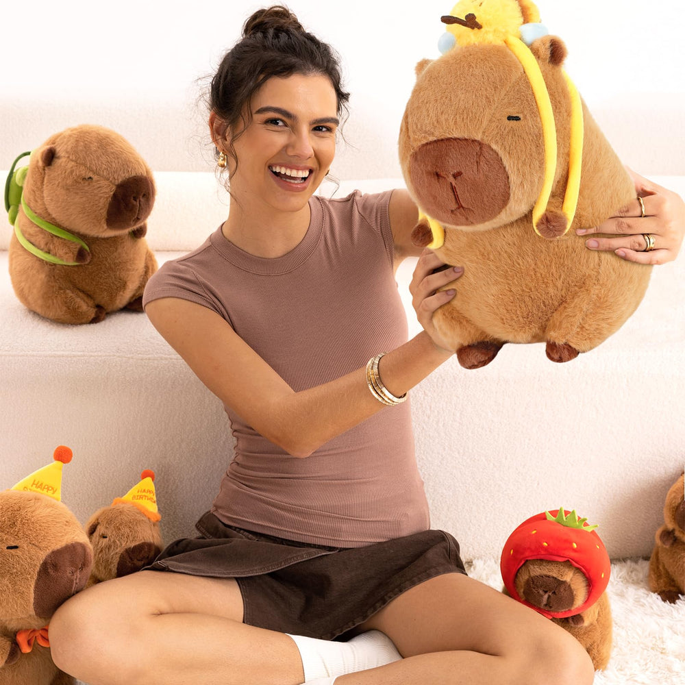 Ditucu capybara plush resting in bed, a plush night companion