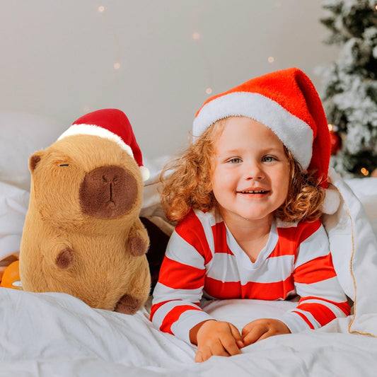 Ditucu capybara plush Santa hat closeup showing soft fur and holiday charm.