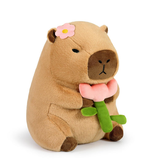 Ditucu capybara plush holding a flower for cozy gift moments.