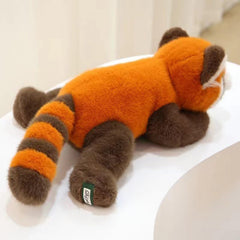 Ditucu red panda plush in a resting pose ideal for naps and reading.